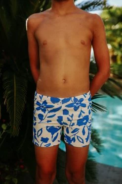 PINK DESERT BOYS EUROPEAN CUT SWIM SHORT IN BLUE FLORAL 8 PINK DESERT BOYS EUROPEAN CUT SWIM SHORT IN BLUE FLORAL