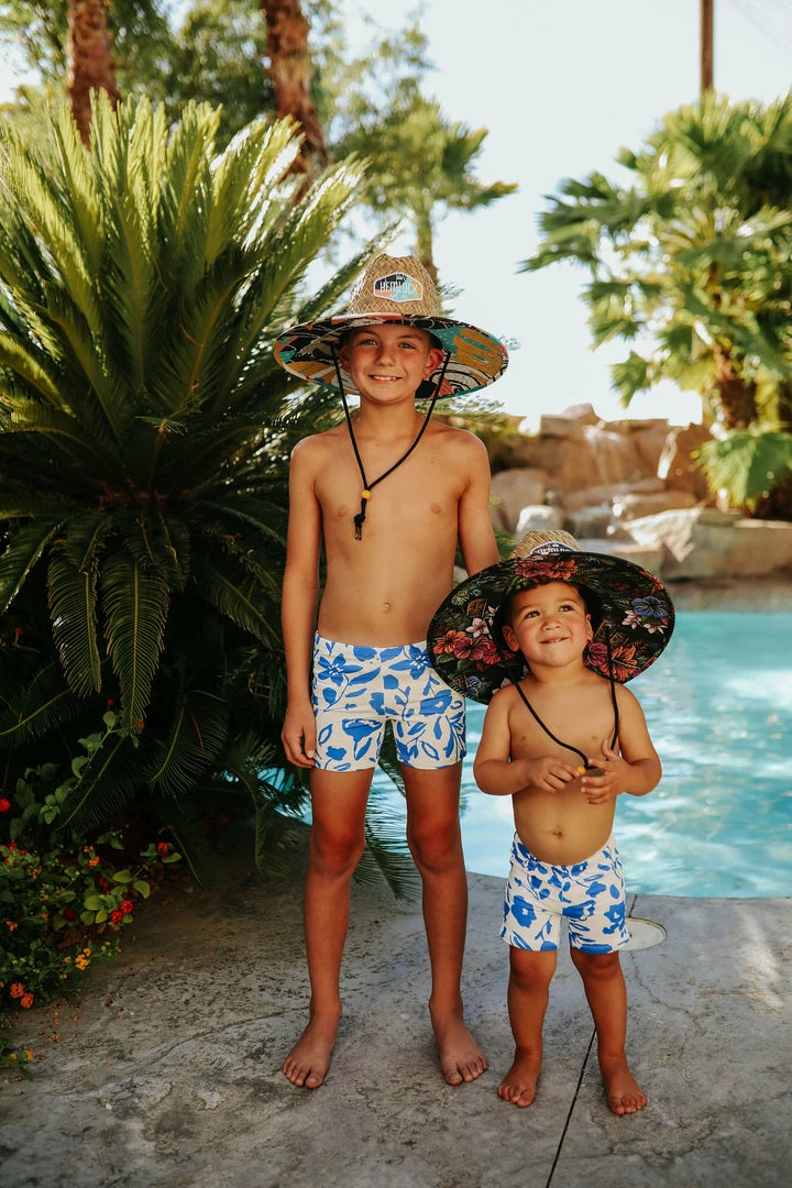 PINK DESERT BOYS EUROPEAN CUT SWIM SHORT IN BLUE FLORAL 6 PINK DESERT BOYS EUROPEAN CUT SWIM SHORT IN BLUE FLORAL