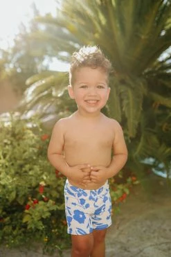 PINK DESERT BOYS EUROPEAN CUT SWIM SHORT IN BLUE FLORAL