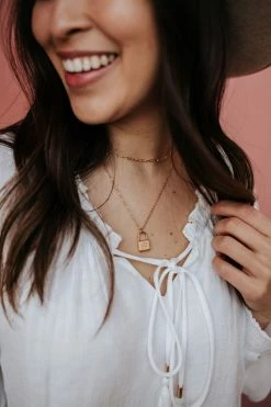 FAIRE ACCESSORIES THE GOLD INITIAL LOCKET NECKLACE