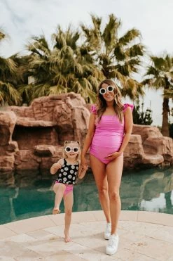 PINK DESERT GIRLS MINI RUFFLE PEPLUM SWIMSUIT SET IN LA LA DAISY AND NEON LILAC