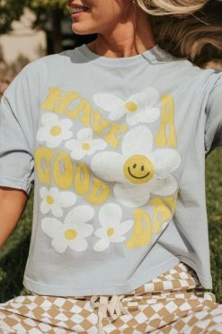 Honestee THE HAVE A GOOD DAY FLORAL GRAPHIC TEE IN OCEAN BLUE TOPS