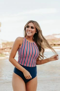 PINK DESERT HIGH NECK RACERBACK ZIPPER MIDKINI SWIM TOP IN AMERICANA STRIPE