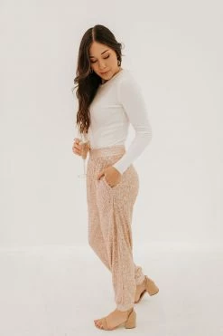 Aaron & Amber THE SHINE BRIGHT SEQUIN JOGGERS IN ROSE CHAMPAGNE BOTTOMS