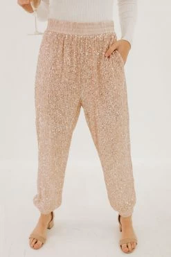 Aaron & Amber THE SHINE BRIGHT SEQUIN JOGGERS IN ROSE CHAMPAGNE BOTTOMS