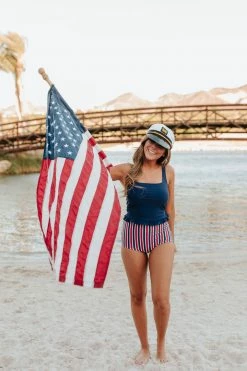 PINK DESERT MINI RUFFLE CROP PEPLUM SWIM TOP IN INDIGO