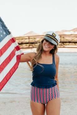 PINK DESERT MINI RUFFLE CROP PEPLUM SWIM TOP IN INDIGO