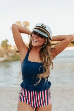 PINK DESERT MINI RUFFLE CROP PEPLUM SWIM TOP IN INDIGO