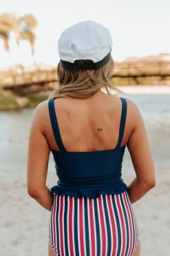 PINK DESERT MINI RUFFLE CROP PEPLUM SWIM TOP IN INDIGO