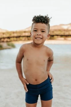 PINK DESERT BOYS EUROPEAN CUT SWIM SHORT IN INDIGO