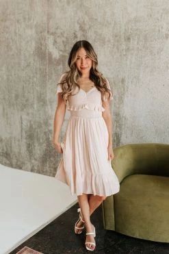 Polagram/Baevely NEW ARRIVALS THE PRECIOUS SMOCKED MIDI DRESS IN LIGHT PEACH