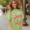 Sweet Claire THE BEVERLY HILLS GRAPHIC TEE IN GREEN TOPS