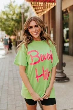 Sweet Claire THE BEVERLY HILLS GRAPHIC TEE IN GREEN TOPS