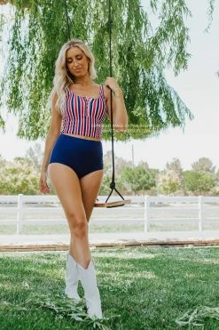 PINK DESERT BUTTON FRONT MIDKINI SWIM TOP IN AMERICANA STRIPE