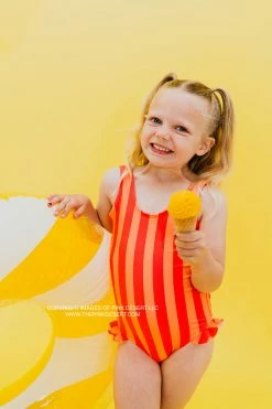 GIRLS MINI RUFFLE LEG SCOOP ONE PIECE SWIMSUIT IN SORBET STRIPE BY PINK DESERT