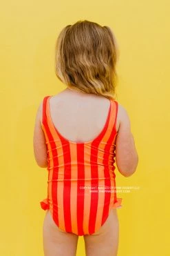 GIRLS MINI RUFFLE LEG SCOOP ONE PIECE SWIMSUIT IN SORBET STRIPE BY PINK DESERT