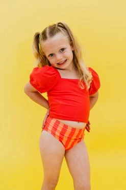 GIRLS PUFF SLEEVE SWIM TOP IN BISOU RASPBERRY BY PINK DESERT