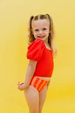 GIRLS PUFF SLEEVE SWIM TOP IN BISOU RASPBERRY BY PINK DESERT