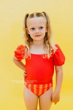 GIRLS PUFF SLEEVE SWIM TOP IN BISOU RASPBERRY BY PINK DESERT