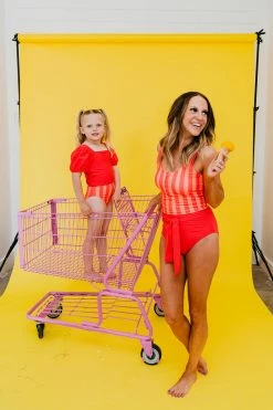 GIRLS PUFF SLEEVE SWIM TOP IN BISOU RASPBERRY BY PINK DESERT