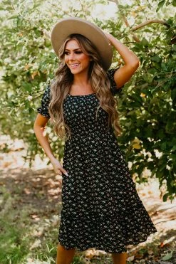 THE PINK DESERT MIDNIGHT GARDEN DRESS IN NAVY