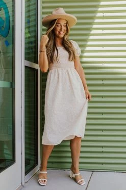 Paper Crane THE BRIA SMOCKED MIDI DRESS IN BLUSH DRESSES