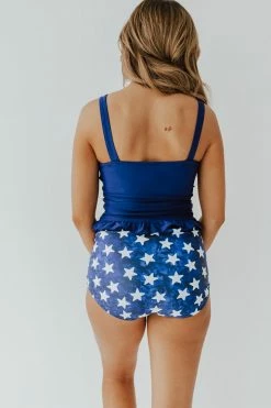 PINK DESERT MINI RUFFLE CROP PEPLUM SWIM TOP IN INDIGO