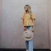 Hayden Los Angeles THE YUMA SMOCKED BABYDOLL TOP IN YELLOW TOPS