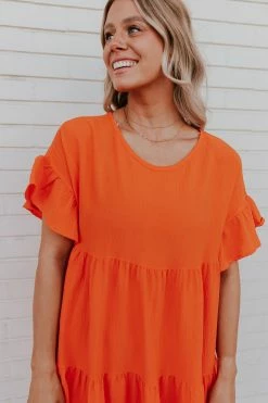 Adora THE OAKLEY TIERED BABYDOLL DRESS IN ORANGE DRESSES 7 Adora THE OAKLEY TIERED BABYDOLL DRESS IN ORANGE DRESSES