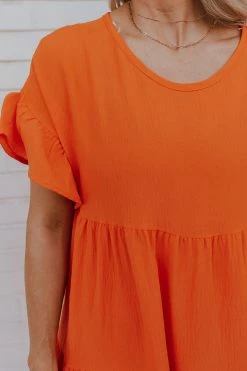 Adora THE OAKLEY TIERED BABYDOLL DRESS IN ORANGE DRESSES 8 Adora THE OAKLEY TIERED BABYDOLL DRESS IN ORANGE DRESSES