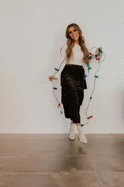 If She Loves THE TENLY TIERED SKIRT IN BLACK ANIMAL PRINT