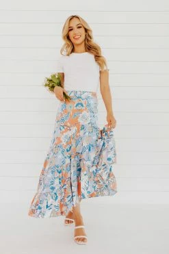 Faith Apparel NEW ARRIVALS THE BOWAN FLORAL MIDI SKIRT IN BLUE
