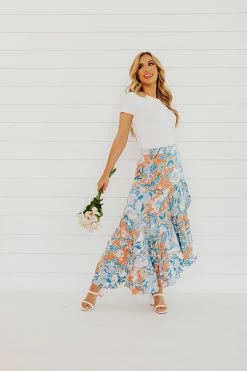 Faith Apparel NEW ARRIVALS THE BOWAN FLORAL MIDI SKIRT IN BLUE