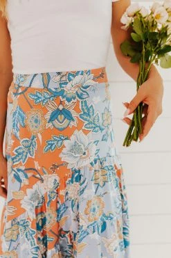 Faith Apparel NEW ARRIVALS THE BOWAN FLORAL MIDI SKIRT IN BLUE
