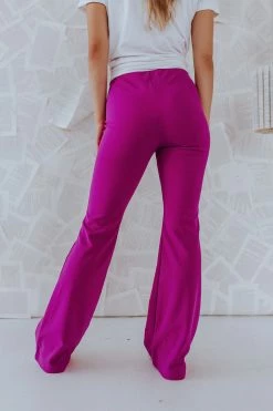 &merci THE MADDIE FLARE PANTS IN DARK MAGENTA