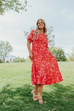 Polagram/Baevely THE REESE SMOCKED MIDI DRESS IN RED DRESSES