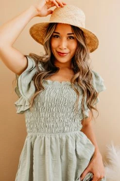 Miou Muse THE SAGE SMOCKED MIDI DRESS IN GREEN