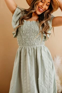 Miou Muse THE SAGE SMOCKED MIDI DRESS IN GREEN