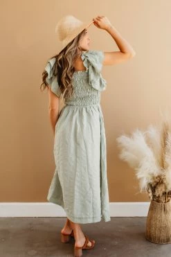 Miou Muse THE SAGE SMOCKED MIDI DRESS IN GREEN