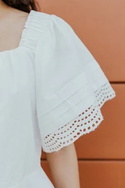 Skies Are Blue TOPS THE CAUGHT MY EYE PEPLUM TOP IN WHITE