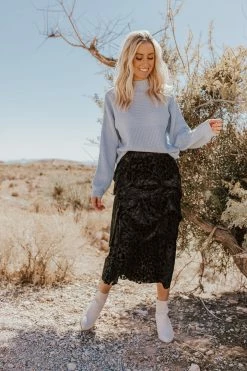 If She Loves THE TENLY TIERED SKIRT IN BLACK ANIMAL PRINT