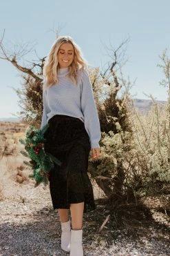 If She Loves THE TENLY TIERED SKIRT IN BLACK ANIMAL PRINT