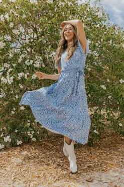 Supreme Fashion THE ISABELLA WRAP DRESS IN BLUE FLORAL DRESSES