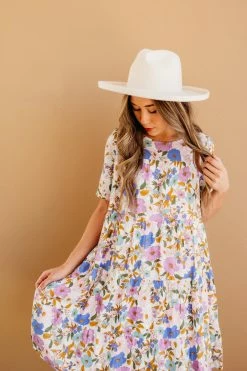 POLAGRAM NEW ARRIVALS THE IVA TIERED BABYDOLL DRESS IN IVORY