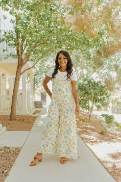 Ces Femme THE TAHITI TIE STRAP JUMPSUIT IN YELLOW FLORAL