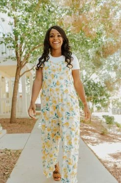 Ces Femme THE TAHITI TIE STRAP JUMPSUIT IN YELLOW FLORAL