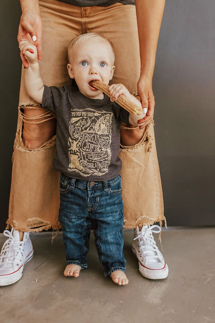 NEW ARRIVALS THE PIRATES KIDS TEE BY HAPPY THREADS X PINK DESERT 1 NEW ARRIVALS THE PIRATES KIDS TEE BY HAPPY THREADS X PINK DESERT