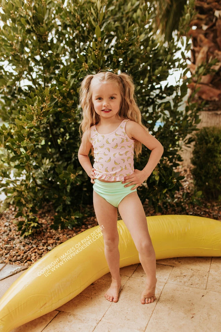 PINK DESERT GIRLS MINI RUFFLE PEPLUM SWIMSUIT SET IN BUBBLEGUM BANANA AND NEON MINT 1 PINK DESERT GIRLS MINI RUFFLE PEPLUM SWIMSUIT SET IN BUBBLEGUM BANANA AND NEON MINT