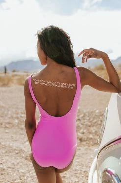 PINK DESERT BUTTON FRONT ONE PIECE IN NEON LILAC
