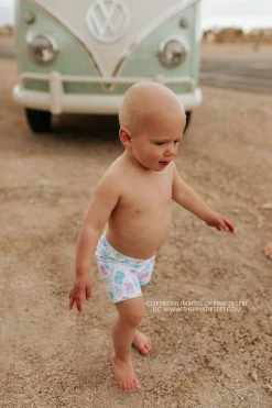 PINK DESERT BOYS EUROPEAN CUT SWIM SHORT IN POPSICLE